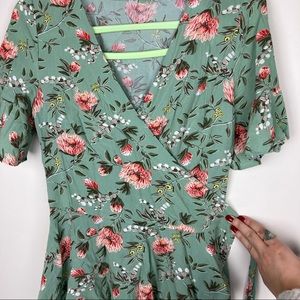 Loft green floral peplum wrap top